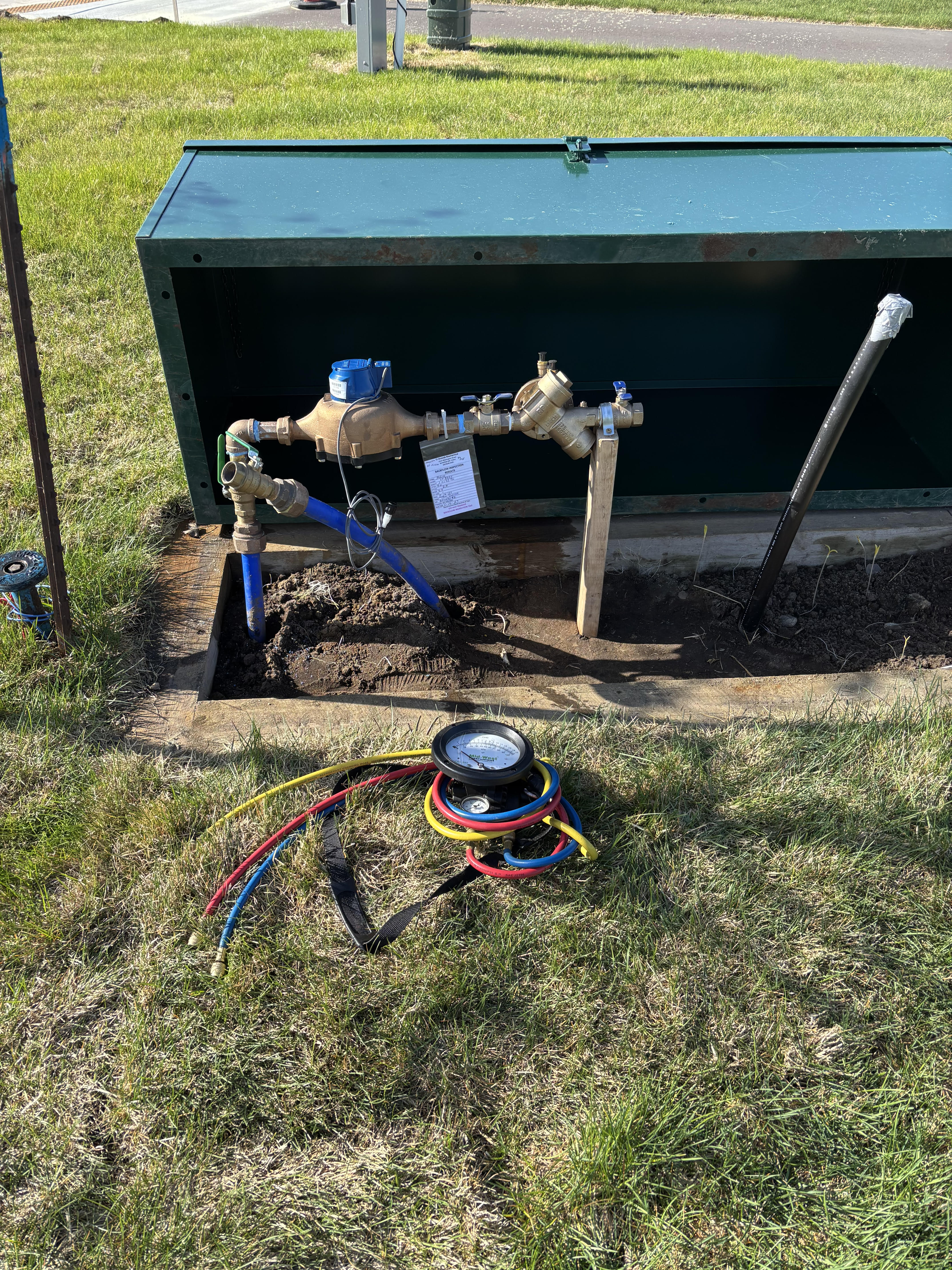 Backflow preventer test in progress — TJ Dvorak Mechanical